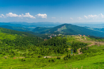 Fototapeta premium Panoramic view of the Dragobrat resort in Ukraine and the Carpathian mountains.