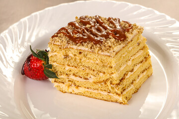 Sweet layered cake served strawberry