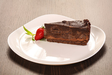 Sweet chocolate cake served strawberry