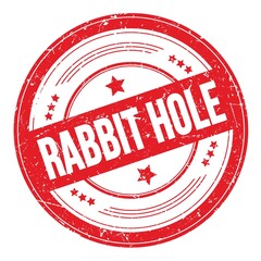RABBIT HOLE text on red round grungy stamp.