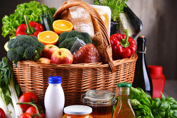 Wicker basket with assorted grocery products