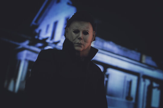 NEW YORK USA, AUGUST 12 2021: scene from John Carpenters Halloween film - slasher Michael Myers stalks in Haddonfield - Trick Or Treat Studios figure