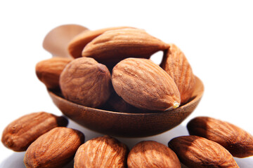 Composition with shellless almonds isolated on white