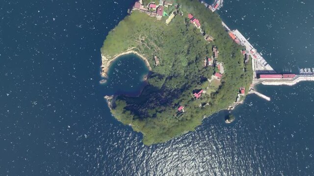 Aerial view of Isola di Nisida is a volcanic islet of the Flegrean Islands archipelago in southern Italy it lies at a very short distance from Cape Posillipo just north of Naples 4k animation