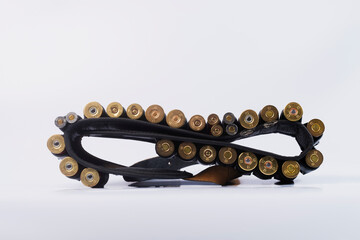 Hunting rifle cartridges. Cartridges on a white isolated background. Cartridges on a wooden table. 