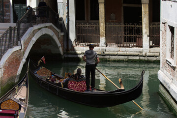 Fototapeta na wymiar One of the characteristic canals of Venice