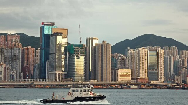 Tug boat cruising Victoria harbor.