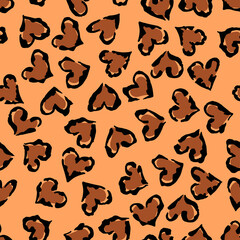 Leopard heart seamless pattern. Vector animal print. Black and brown spots on beige background. Jaguar, leopard, cheetah, panther fur. Leopard skin imitation can be painted on clothes or fabric.