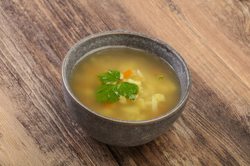 Tasty chicken soup with carrot