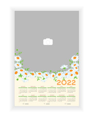 Wall Photo Calendar 2022. Beautiful, elegant , floral vertical photo calendar template with daisy. Calendar design 2022 year in English. Week starts from Sunday. Vector illustration