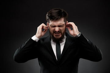 Businessman with strong painful headache