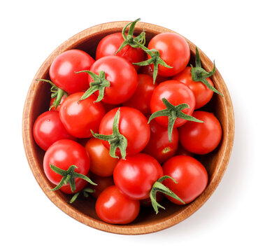 Cherry tomatoes in a plate on a white background, isolated. Top view