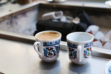 selective focus, Turkish coffee cooked on charcoal for tourists in Eminönü