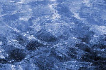 Blue bright transparent background of pool water