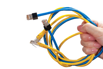 Blue and yellow Ethernet cables in women's hand isolated on white background. Bundle of Ethernet...