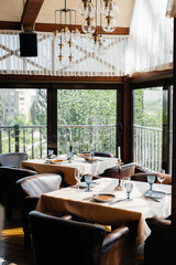 A beautifully laid table with exquisite dishes in a modern restaurant.