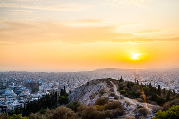 Panorama of Athens cityscape at sunset, Greece