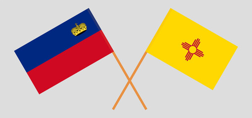 Crossed flags of Liechtenstein and the State of New Mexico. Official colors. Correct proportion