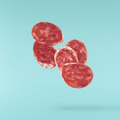 Fresh sausage falling in the air