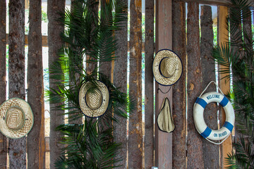 summer hats on the wall