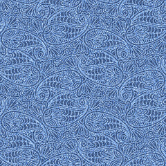 Indian paisley seamless pattern on Denim texture. Repetitive Turkish cucumber ornament on blue Jeans textured background.