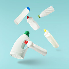 Fototapeta premium Household cleaning product. A plastic bottle falling in the air
