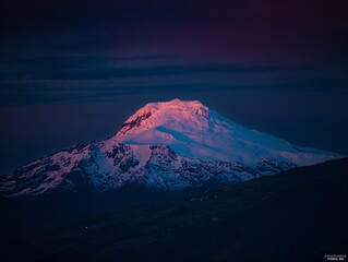 Fototapeta na wymiar Cayambe volcano (5.970 m.) at sunset.