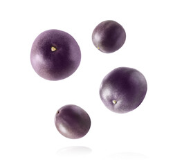 Fresh ripe passion fruit falling in the air