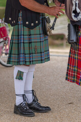 Langrune-Sur-Mer, France - 08 05 2021: Auld Alliance Pipe Band: Detail of the costume and...