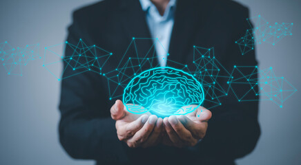 Businessman touch  brain icon and line control in graph Screen Icon of a media screen, Technology Process System,Concept Futuristic medicine, the human body, and the future,brain. Online consultation.