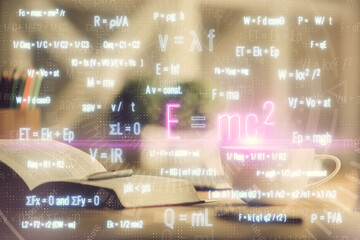Obraz premium Double exposure of formula drawing and desktop with coffee and items on table background. Concept of education