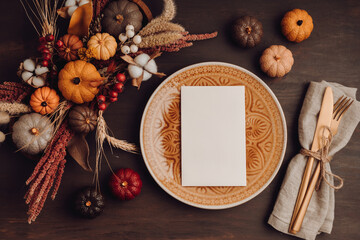 Rustic menu mockup with plate and autumn table decoration.  Floral interior decor for fall holidays...