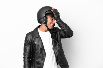 Young man with a motorcycle helmet isolated on white background has realized something and intending the solution