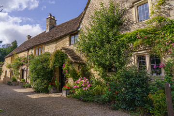 Fototapeta na wymiar beautiful 16th / 17th century property in the scenic Wiltshire UK Cotswold village of Castle Combe