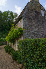 Fototapeta na wymiar beautiful 16th / 17th century cottage property in the scenic Wiltshire UK Cotswold village of Castle Combe