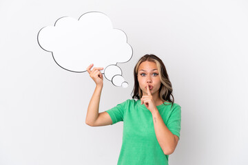 Teenager Russian girl isolated on blue background holding a thinking speech bubble and doing silence gesture