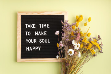 Felt letter board with text take time to make your soul happy. Mental health, positive thinking, emotional wellness concept