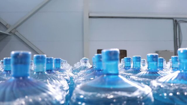 Large plastic empty bottle. A range of custom made empty 5 gallon refillable bottles