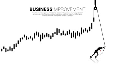 Silhouette of businessman pull up the business graph with rope and reel. concept of business improvement.