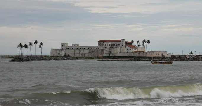 Elmina Castle across bay at Cape Coast Ghana Africa. Ghana West Africa on the Atlantic ocean. Erected by the Portuguese in 1482. Over 500 years it was major slave castle in Africa.