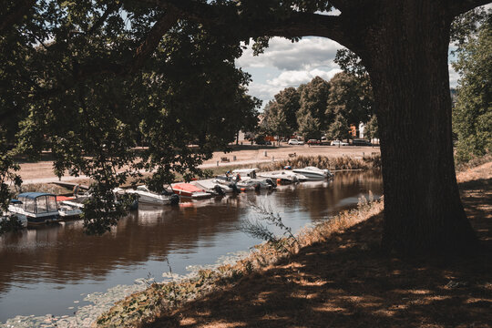 Parnu, Estonia / July 30, 2021: Boats in Valli park in Parnu, beautiful colorful estonian city by the Baltic sea, Europe