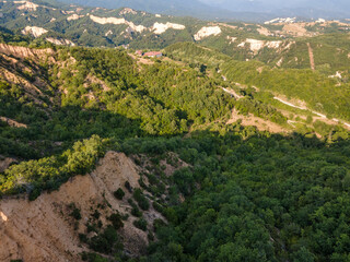 Fototapeta premium Aerial sunset view of Rozhen sand pyramids, Bulgaria