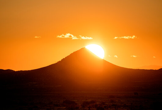 Usa, New Mexico, Santa Fe, El Dorado, Sun setting over hills