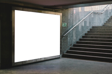 Blank white mock up billboard banner. Display in subway with stairs. Underground. Advertising. Ad....