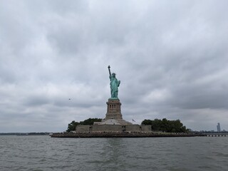 Fototapeta premium Statue of Liberty on a cloudy day - July 2021