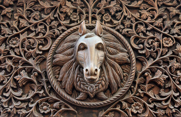 wood carved horse face