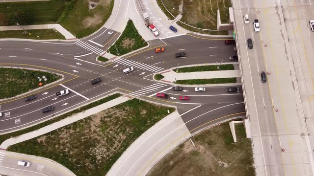 Diverging Diamond Interchange - Vehicles Driving Along Double Crossover Diamond Interchange At Michigan, USA. - Aerial