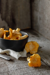 Mushrooms chanterelle on wooden vintage background