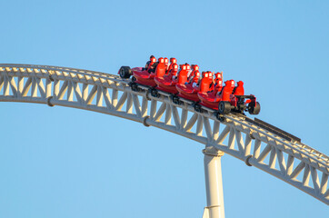 Close up view of a modern formula1 style roller coaster  - obrazy, fototapety, plakaty