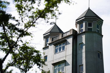 The symbol tower towering over the rose garden